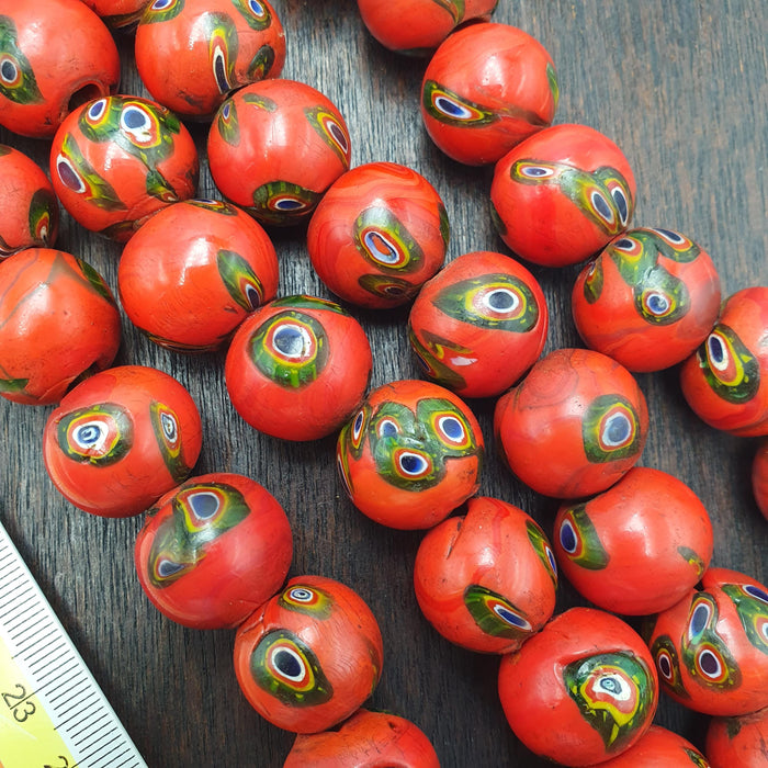 East Oasis Vintage Venetian Style Orange Red Millefiori Bead Strand with Green Eyes 18mm