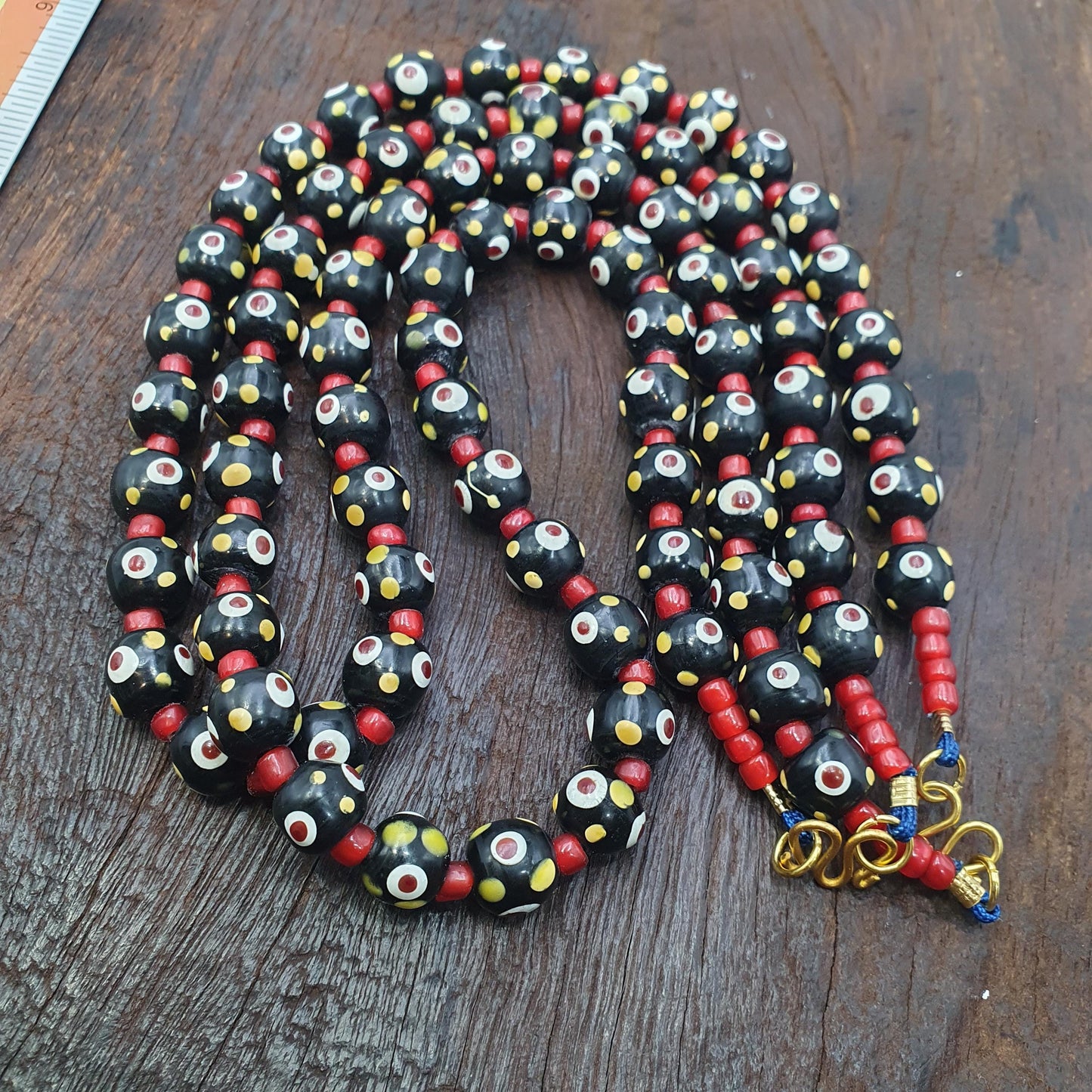 Black venetian style hundred red eyes skunk  beads necklace10mm & 20 inches long