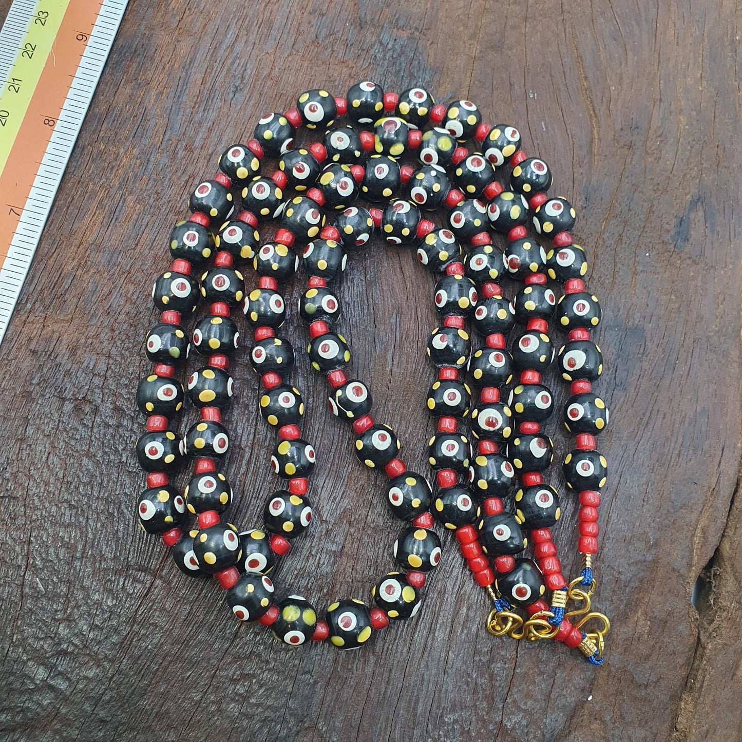 Black venetian style hundred red eyes skunk  beads necklace10mm & 20 inches long