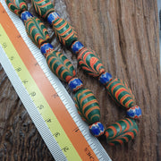 Vintage beads collection feather and Chevron pattern glass beads necklace .