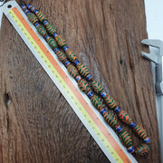 Vintage beads collection feather and Chevron pattern glass beads necklace .