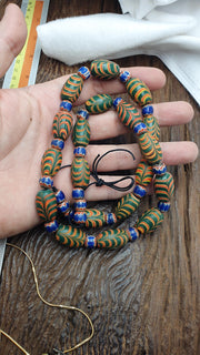 Vintage beads collection feather and Chevron pattern glass beads necklace .