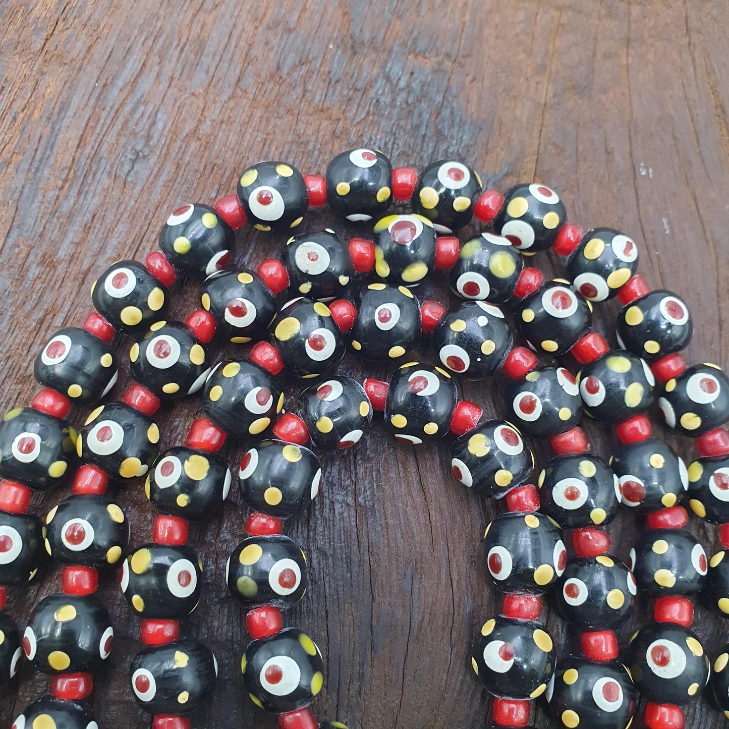 Black venetian style hundred red eyes skunk  beads necklace10mm & 20 inches long