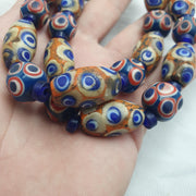 Hundred Eyes Skunk, Venetian Style Necklace | Glass Venetian Inspired Beads | 10mm Diameter, 22 Inches, Red Eye Accents