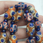 Hundred Eyes Skunk, Venetian Style Necklace | Glass Venetian Inspired Beads | 10mm Diameter, 22 Inches, Red Eye Accents
