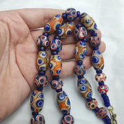 Hundred Eyes Skunk, Venetian Style Necklace | Glass Venetian Inspired Beads | 10mm Diameter, 22 Inches, Red Eye Accents