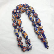 Hundred Eyes Skunk, Venetian Style Necklace | Glass Venetian Inspired Beads | 10mm Diameter, 22 Inches, Red Eye Accents