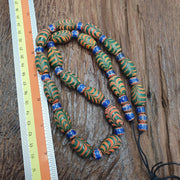 Vintage beads collection feather and Chevron pattern glass beads necklace .
