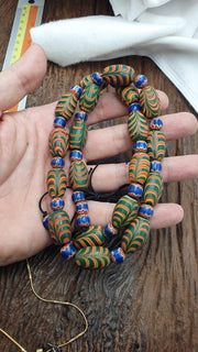 Vintage beads collection feather and Chevron pattern glass beads necklace .