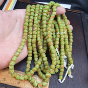 Colorful Lime Green Candy Stripe Strand, Venetian Inspired Skunk Trade Beads, Red White Diagonal Stripes, 8.5mm Glass