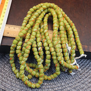 Colorful Lime Green Candy Stripe Strand, Venetian Inspired Skunk Trade Beads, Red White Diagonal Stripes, 8.5mm Glass