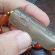 Translucent Chalcedony Cylinder Seal Necklace | Hand-Carved Mesopotamian Animal Motif | Historical Statement Jewelry