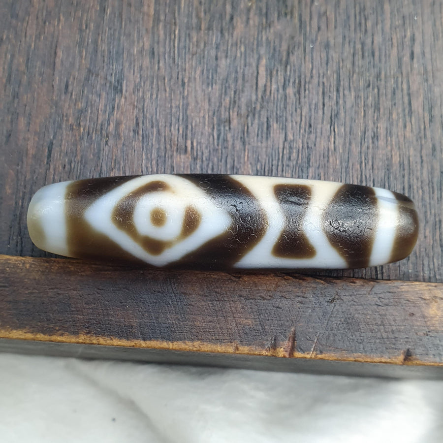 Taiwan etched agate dzi bead with unique eyes pattern – photo 1 of 5