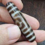 Tibetan-style 3 eye dzi bead in weathered banded agate – photo 5 of 5