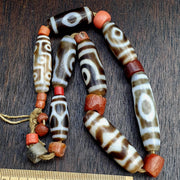 Tibetan-style mala necklace with 8 dzi beads, carnelian and red coral – photo 1 of 5