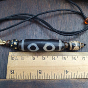 Tibetan-style 3 eye dzi bead with rustic dragon skin weathering – photo 1 of 5