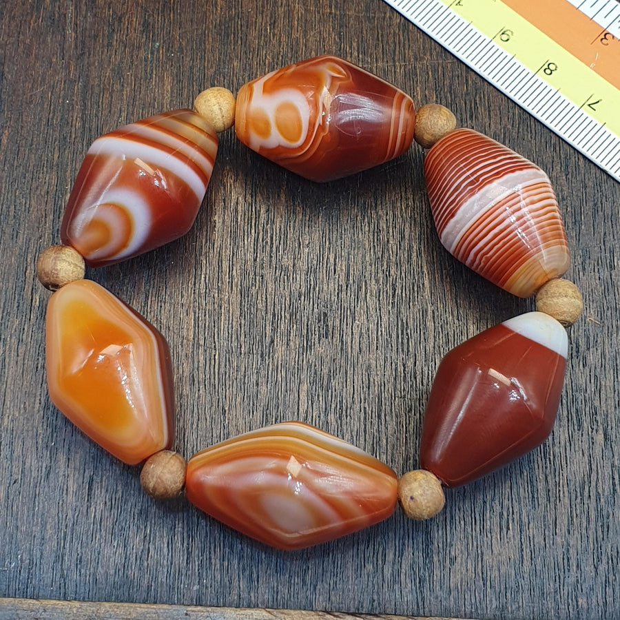 Tibetan Red Agate, Vintage Tribal Bracelet | Carnelian Beads | Stretch One Size, Unique Eyes Pattern