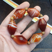 Tibetan Red Agate, Vintage Tribal Bracelet | Carnelian Beads | Stretch One Size, Unique Eyes Pattern