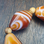 Tibetan Red Agate, Vintage Tribal Bracelet | Carnelian Beads | Stretch One Size, Unique Eyes Pattern