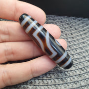 Himalayan Tibetan 2 eye dzi Agate bead amulet with nice soft patina