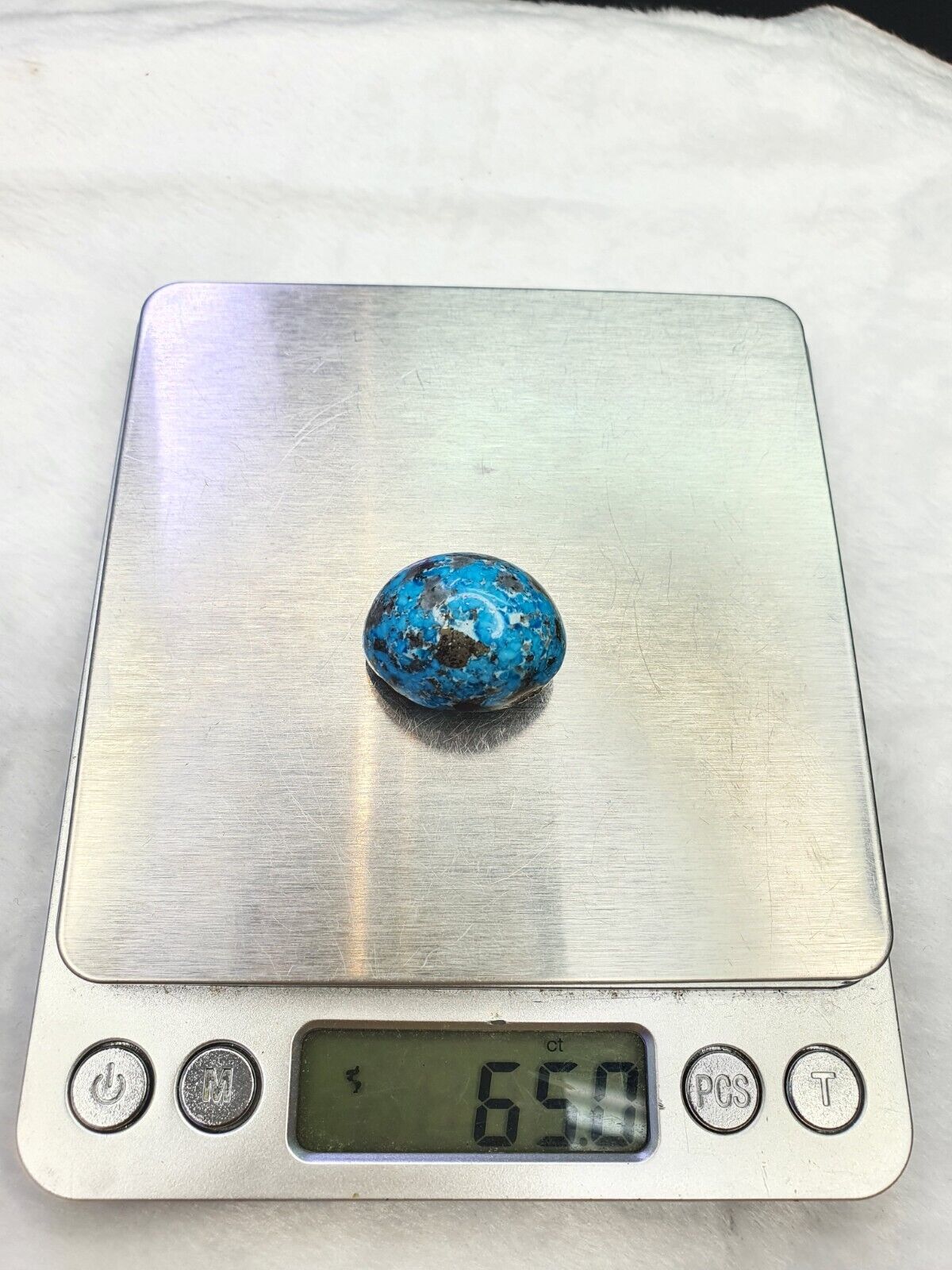 Ein ovaler 100 % echter persischer Türkis-Cabochon mit 65 ct