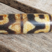 Rare antique double tasso Himalayan agate dzi bead – photo 7 of 8