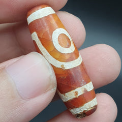 INDO TIBETAN ETCHED LINE DECORATED TAPERED TUBE 2 EYE DZI