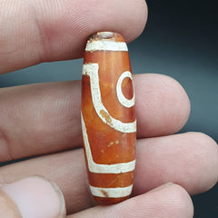 INDO TIBETAN ETCHED LINE DECORATED TAPERED TUBE 2 EYE DZI