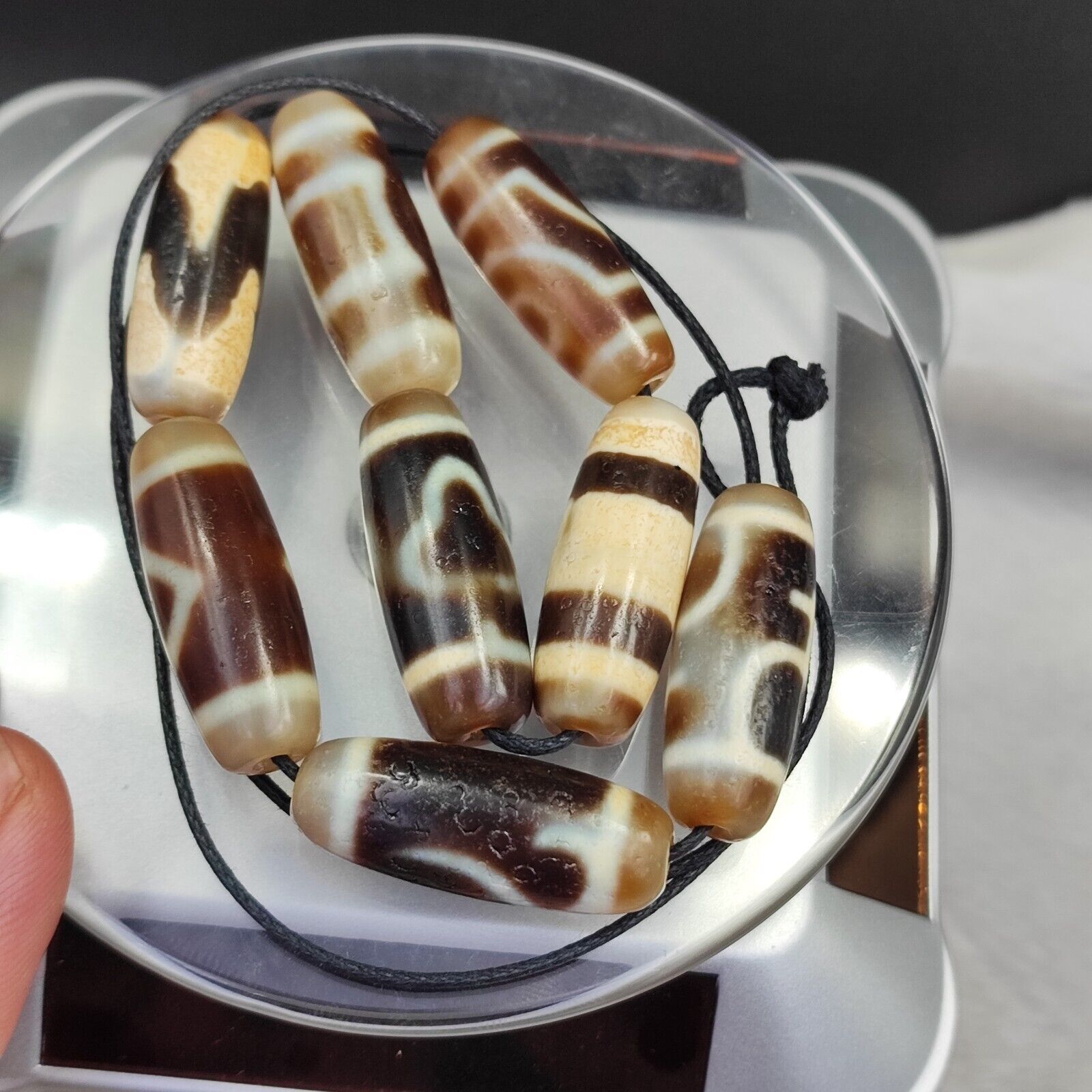 Lot 8 Sacred Treasures: Unveiling the Mystique of Tibetan Antique Dzi Beads