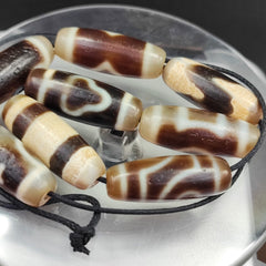 Lot 8 Sacred Treasures: Unveiling the Mystique of Tibetan Antique Dzi Beads