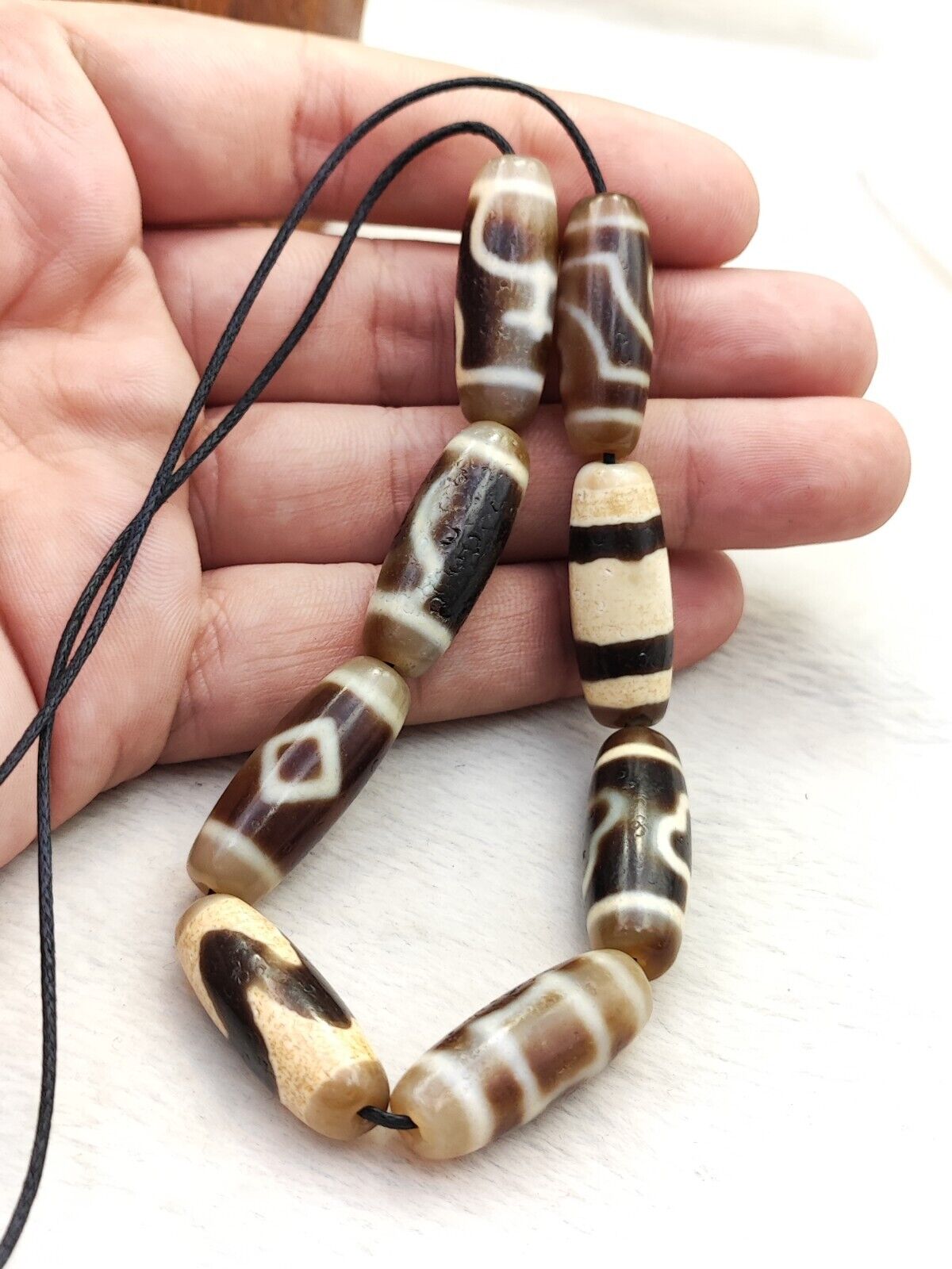 Lot 8 Sacred Treasures: Unveiling the Mystique of Tibetan Antique Dzi Beads