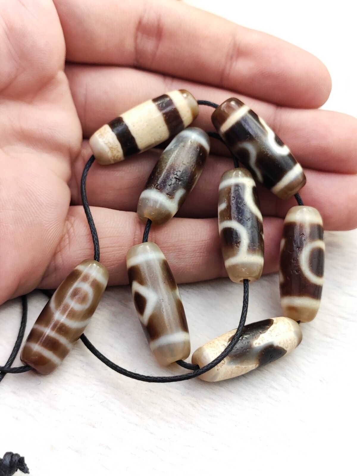 Lot 8 Sacred Treasures: Unveiling the Mystique of Tibetan Antique Dzi Beads