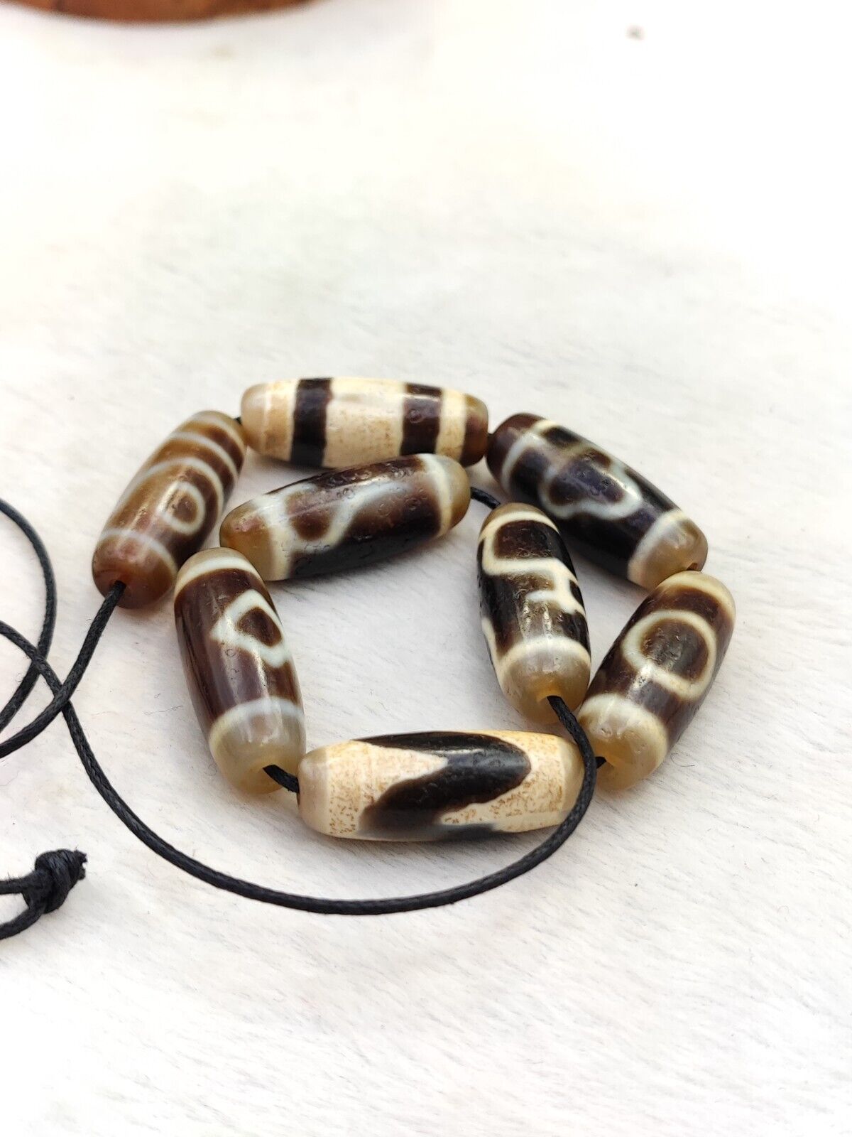 Lot 8 Sacred Treasures: Unveiling the Mystique of Tibetan Antique Dzi Beads