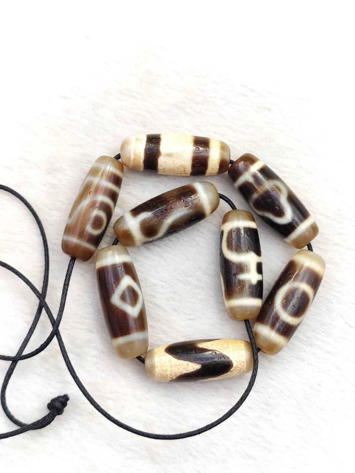 Lot 8 Sacred Treasures: Unveiling the Mystique of Tibetan Antique Dzi Beads