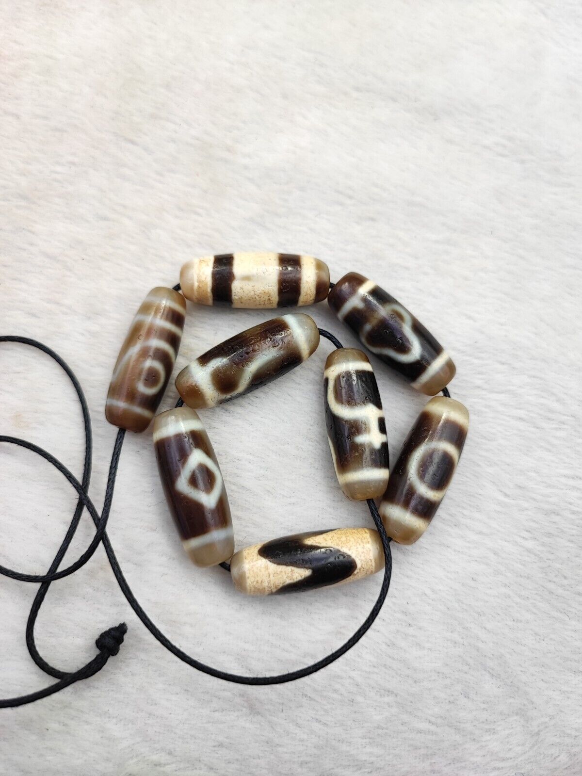 Lot 8 Sacred Treasures: Unveiling the Mystique of Tibetan Antique Dzi Beads