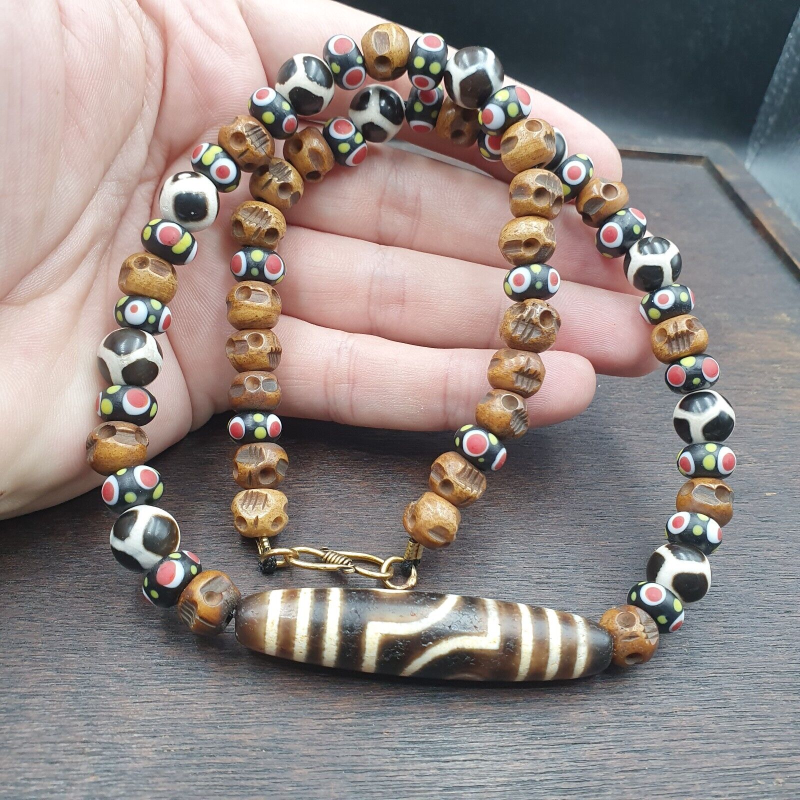 Vintage Himalayan Tibetan 2 Eye Dzi Bead Amulet with Skull and Football Shape