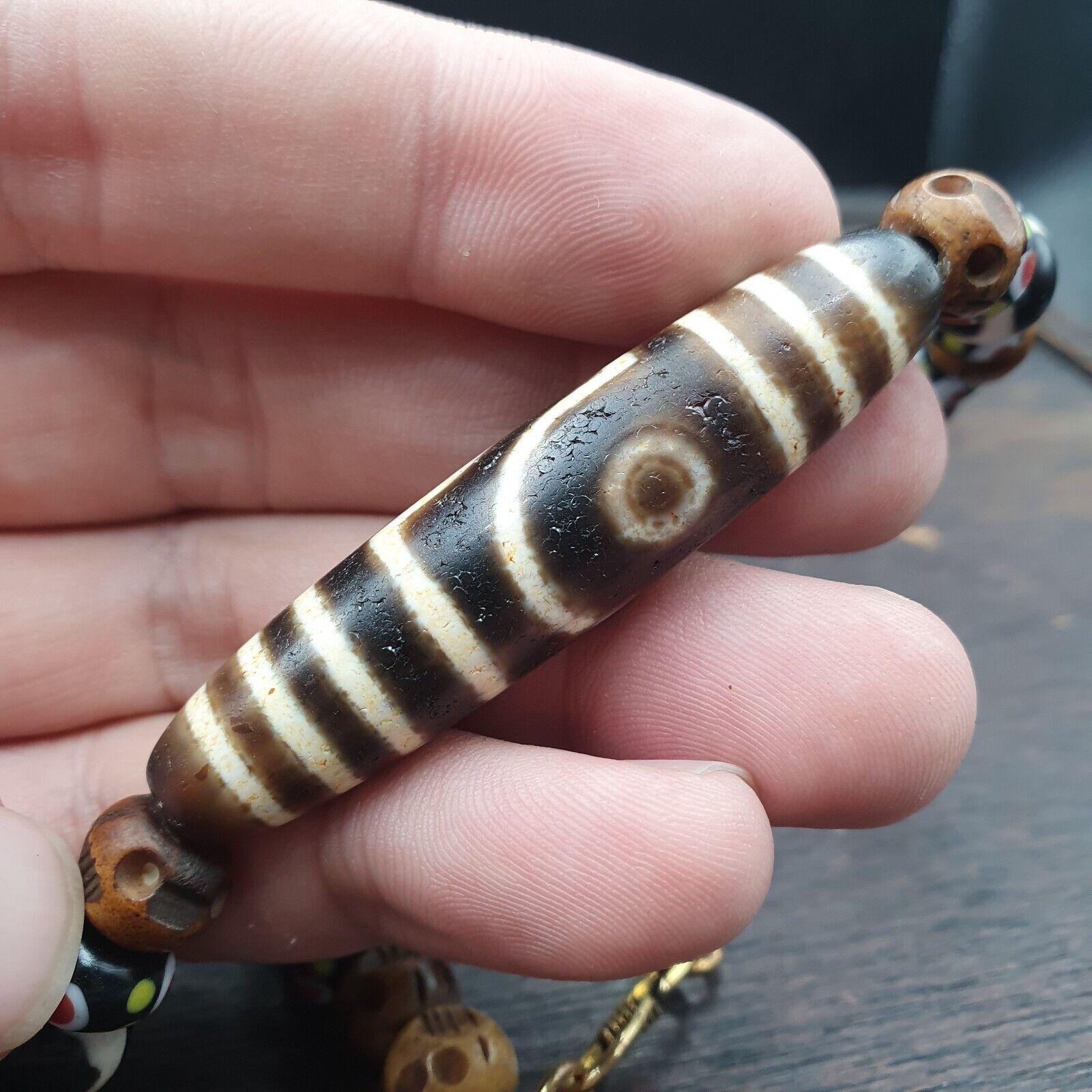 Vintage Himalayan Tibetan 2 Eye Dzi Bead Amulet with Skull and Football Shape