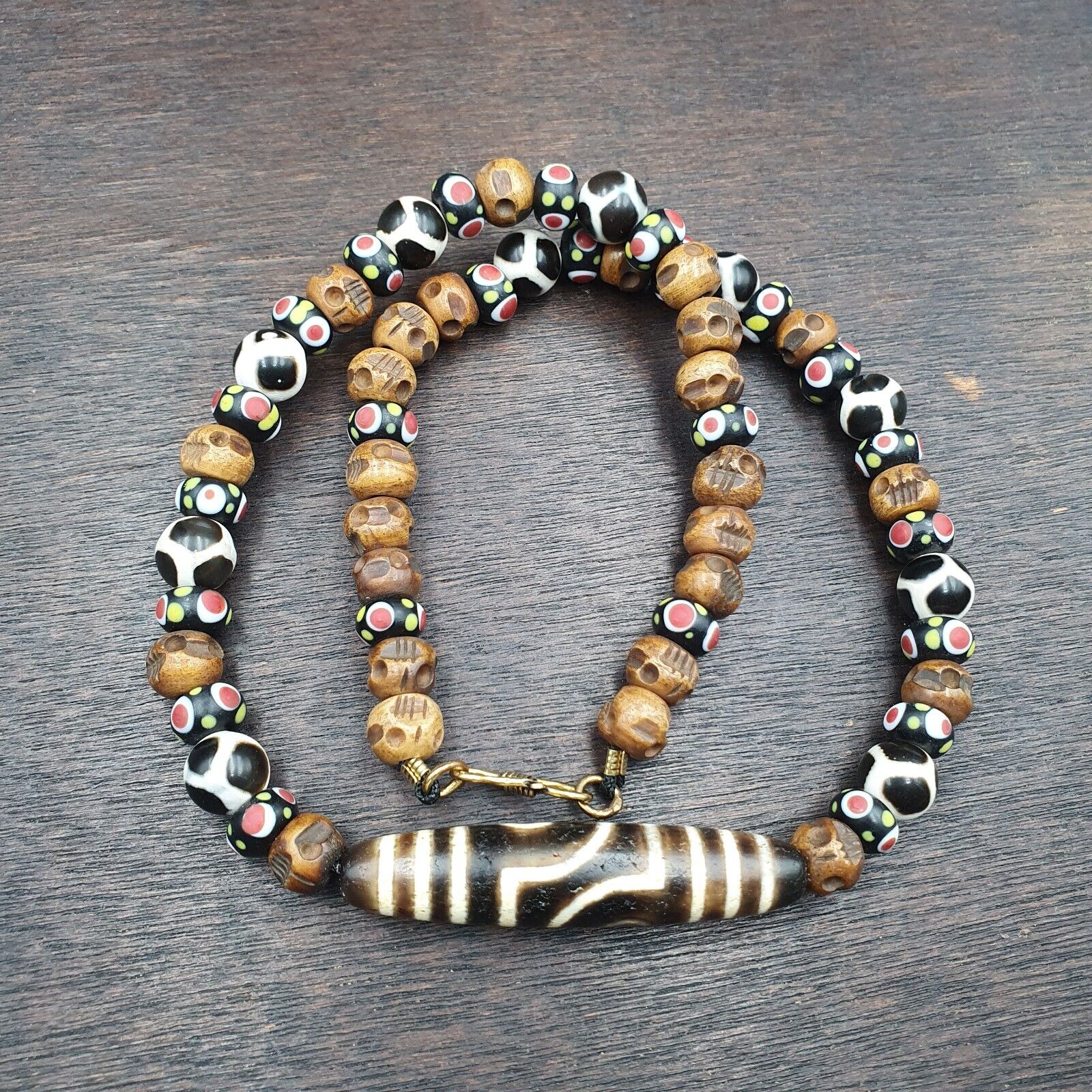 Vintage Himalayan Tibetan 2 Eye Dzi Bead Amulet with Skull and Football Shape